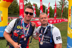 Stu Rodd and his guide, Richard Phinbow from Blind Veterans UK, with their medals