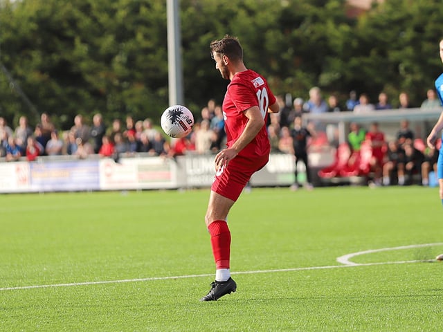 National League South action at Woodside Road between Worthing and Truro City