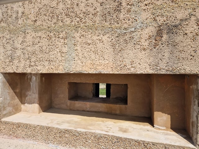Pete Coe, one of the project leaders, and fellow former Royal Engineer Graham Cosham worked together to open the southern embrasure at the Ferring pillbox