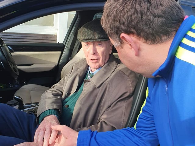 Sam 'Elvis' Labat shakes Sir Michael Caine's hand