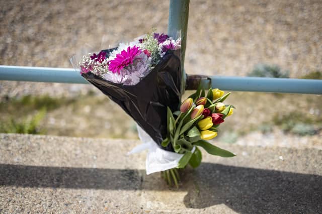 Flowers have been laid at the site.