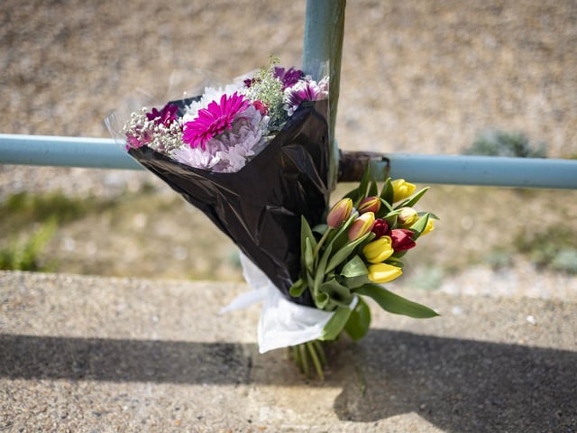 Flowers have been laid at the site.