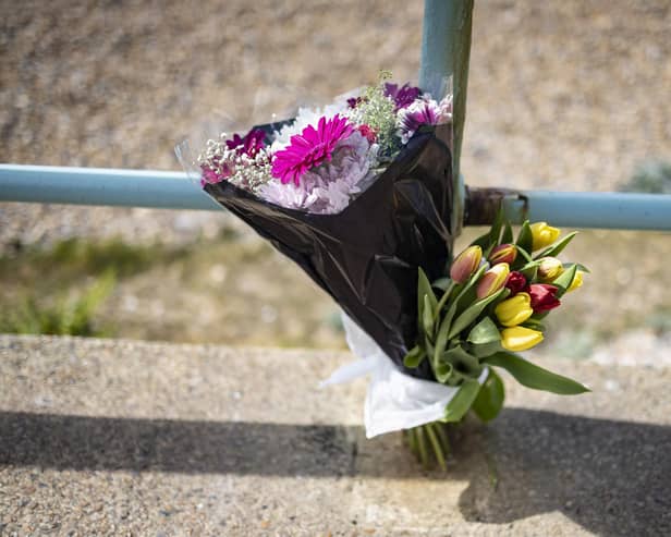 Flowers have been laid at the site.
