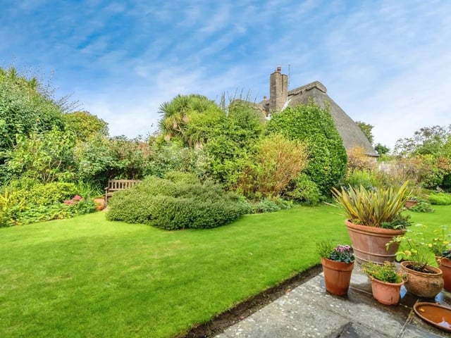 Located just a short walk from the beach, the rear gardens give any potential owners plenty of ways to soak up the sun.