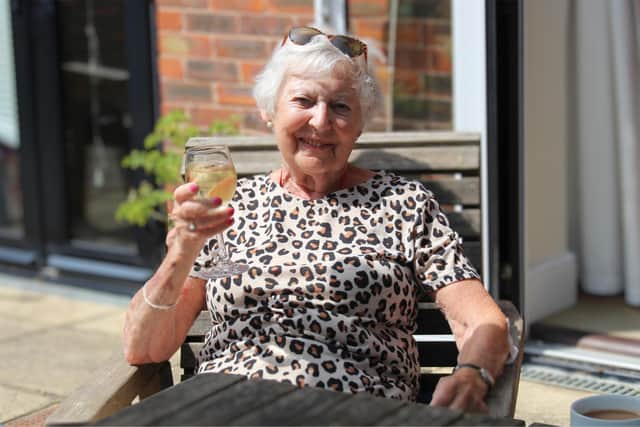 Pat has loved making new friends at Caer Gwent in Worthing. Picture: Guild Care