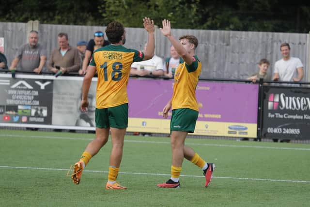 Charlie Hester-Cook (right) celebrates scoring in Horsham's 2-0 FA Trophy third qualifying round win over Brightlingsea Regent on Saturday. Picture by John Lines