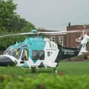 Photos show a HEMS (helicopter emergency medical service) chopper has landed in the grounds of Thomas A Becket Junior School