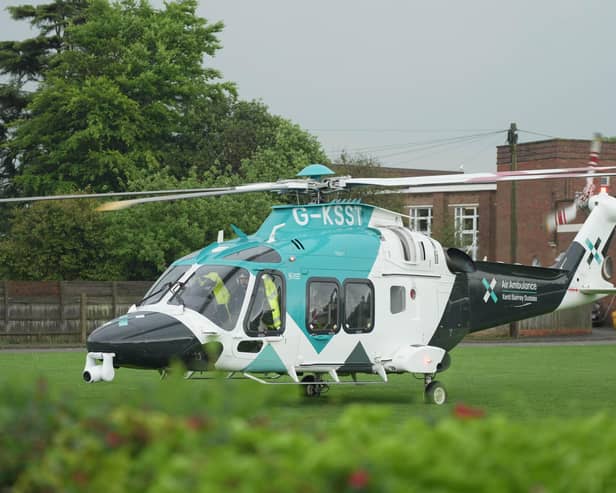 Photos show a HEMS (helicopter emergency medical service) chopper has landed in the grounds of Thomas A Becket Junior School