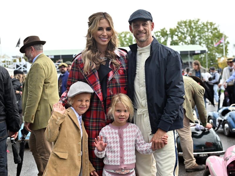 Jenson Button and Brittny Button with family during day-two of the Goodwood Revival at the Goodwood Motor Circuit.