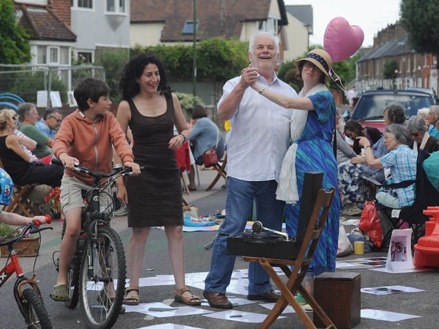 Former Chichester mayor Michael Woolley enjoys a dance with street party organiser Sarah Sharp