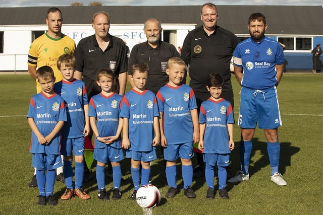 Mascots line up before the Selsey v Godalming Town kick off