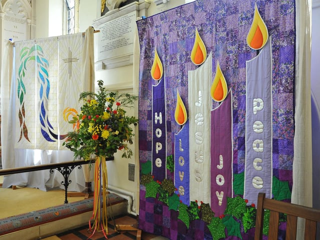 To celebrate the Queen's Jubilee a Flower and Quilt show in St Mary's Church with flower arrangements by Worthing Flower Club and quilted banners by Chris Diebel. Pic S Robards SR2206021