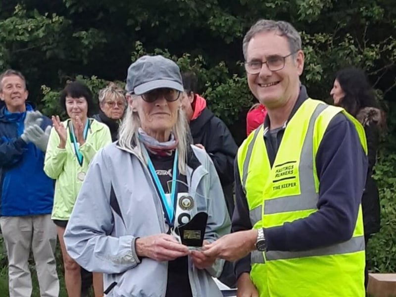 Erica Wilson receives her Improvers Award for the club Spring 5kms