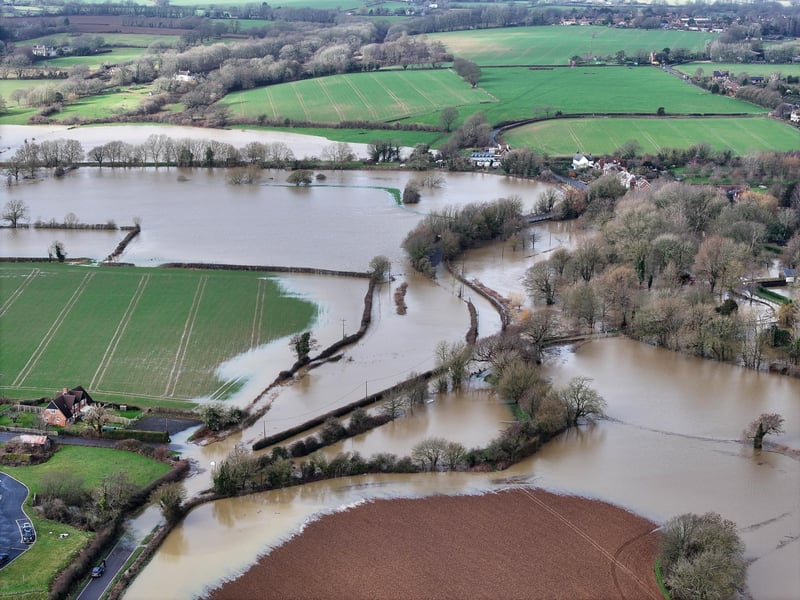 A road off the A26 remains closed following heavy rainfall last week which has submerged a village near Lewes.