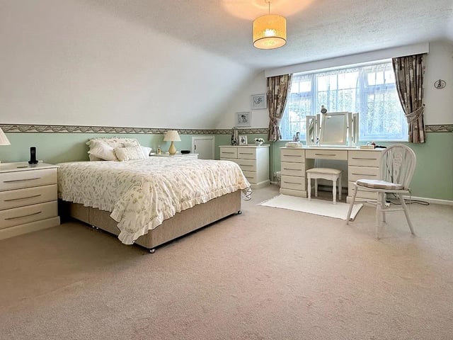 One of the property's four well-sized bedrooms.