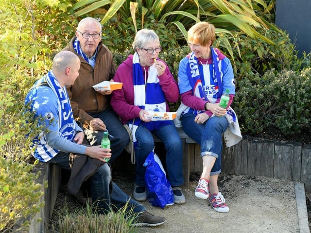 Fans arrive at the stadium for the Premier League match between Brighton and Hove Albion and Manchester United at Amex Stadium on May 4, 2018.