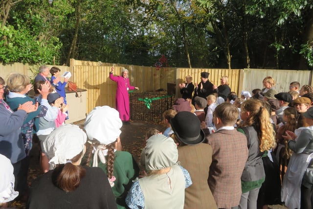 The Bishop of Horsham, the Rt Rev Ruth Bushyager, cut a ribbon to formally open a new school play area – now named ‘King’s Grove’, by popular vote of the pupils.