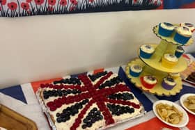 A slice of celebration! Residents at Mountside Care Home tucked into this beautifully homemade Union Jack cake—served with a classic British cuppa, just like in wartime Britain. A sweet tribute to VE Day!