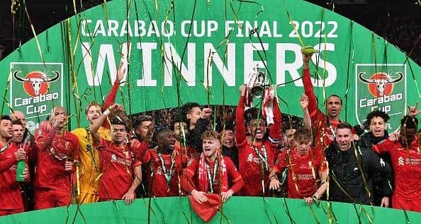 Liverpool players celebrate victory in the Carabao Cup last season after beating Chelsea in the final at Wembley