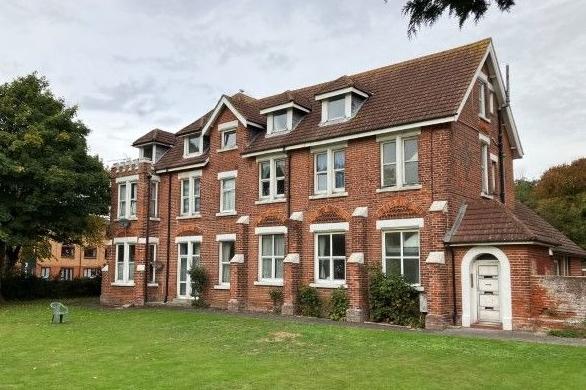 The listing for Wellesley Court, in Fitzalan Road, Littlehampton, says: "An unusual opportunity to acquire this substantial freehold property, which has been converted into 10 self-contained units". The property is due to be sold at auction on January 31, and has a guide price of £1.7million.