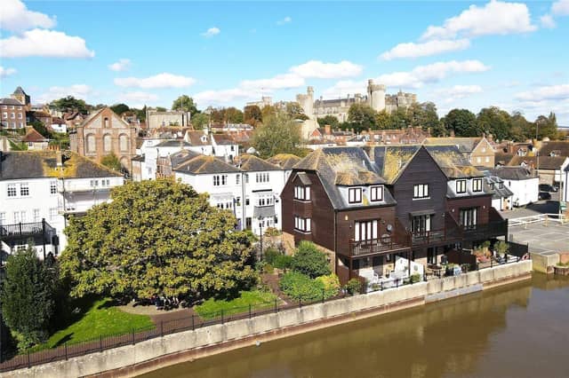 This luxury riverside townhouse with sweeping river, castle and cathedral views has come on the market with Graham Butt Estate Agents priced at £950,000 ,