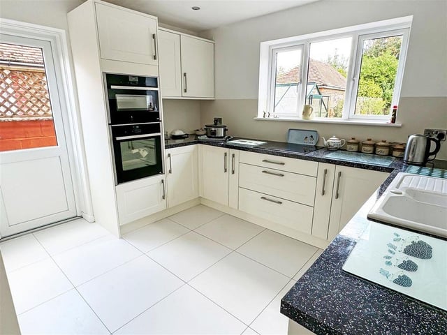 This five-bedroom detached house in a private road has come on the market with Glyn Jones priced at £650,000.