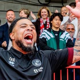 Crawley Town boss Colin Kazim-Richards celebrates surviving on the final day of the 2025/26 season | Picture: CTFC