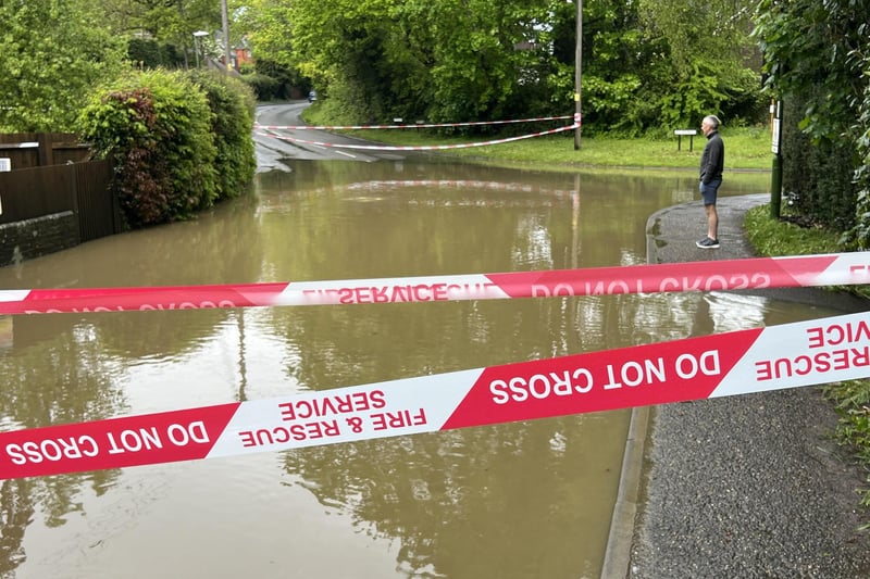 In Pictures: West Sussex road closed following heavy flooding