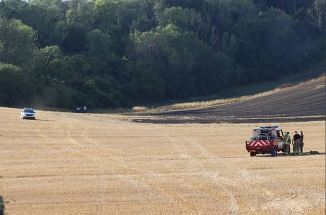 Firefighters successfully extinguished a fire in a field at Upwaltham, close to the A285. Photo: Jack Chiverton