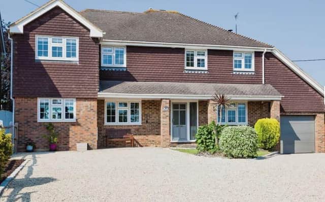 This five-bedroom detached property in Furze Road, Rudgwick, is on the market with a guide price of £900,000.