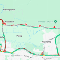 A27 closed following reports of collision and fallen trees
