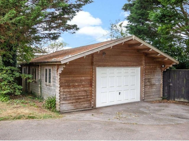 Hidden from the road, Horton Hall is approached via a private lane which leads to a gated driveway and turning circle, with a central fountain, to the north of the house; just off the turning circle is a substantial timber garage and workshop