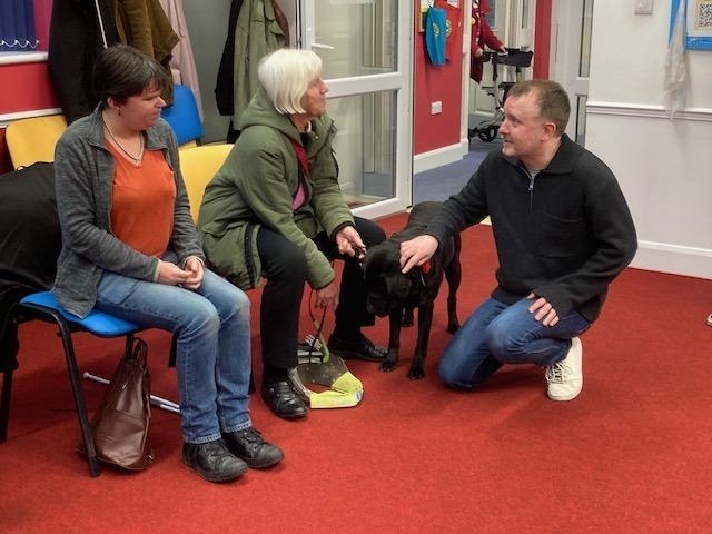 Comedians Chris McCausland and Jon Long with Sight Support Worthing volunteers and members at the charity's centre in Rowlands Road