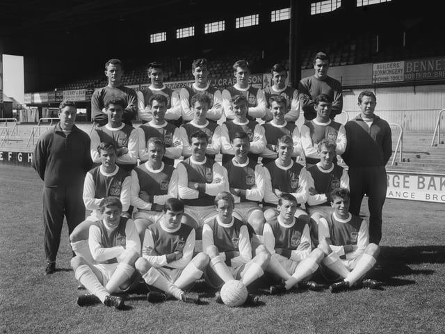 Brighton & Hove Albion line-up ahead of the 1964/65 season. It was a season to remember with the lads winning the Division Four title and scoring a whopping 102 goals on their way to glory.