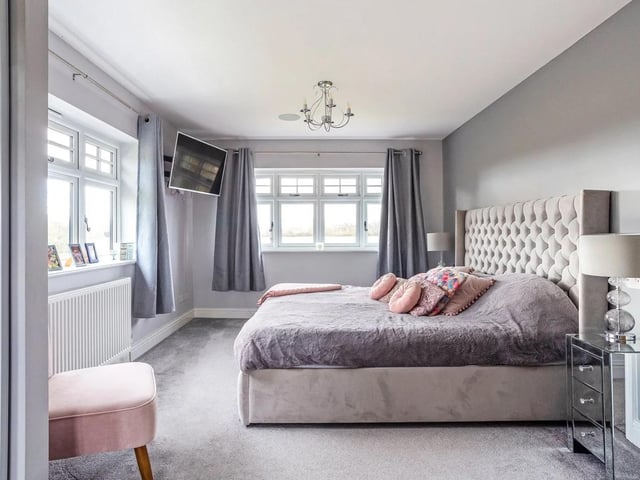 The first floor provides five bedrooms. The principal suite occupies the southern end with a walk-through dressing area and an ensuite shower room