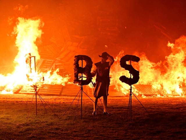 The 'enormous' bonfire was lit at 7.30pm, and was followed closely by the fireworks display