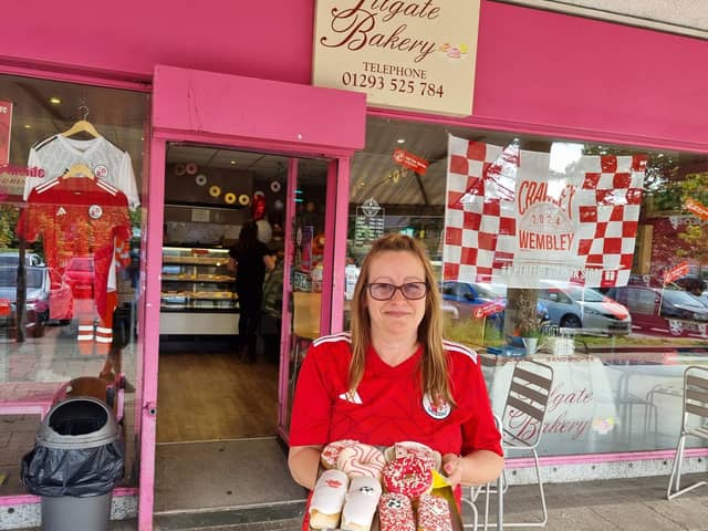 Tilgate Bakery owner Jane Kirkham with her special red and white products to celebrate Crawley Town getting to Wembley | Picture: Mark Dunford