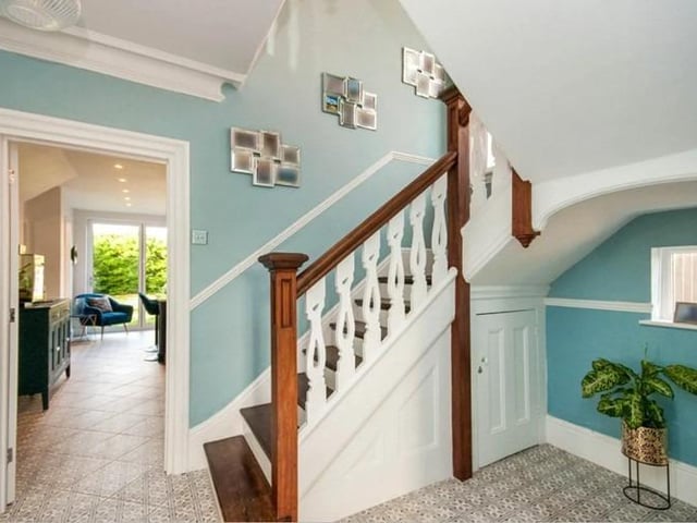 The property consists of a front porch and beautiful period entrance hallway with stairs leading to the second floor. A spacious lounge, large dining room, and a stunning fitted kitchen with island.