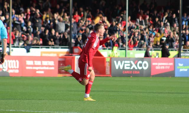 James Tilley celebrates. Action from Crawley Town's 2-1 win over Newport County. Picture by Cory Pickford