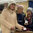 The lucky winner of a bottle of champagne was Lynne Cushing, whose prize is being coveted by, left to right, Kelly Verstappen, Alison Kemish, Claire Carpenter and Lex Lake, already in survival-gear mode for Sheila's Island at the Barn Theatre, Southwick, from July 10 to 13 inclusive