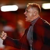 Crawley Town boss Scott Lindsey celebrated a late win at Bradford City. (Photo by Mike Hewitt/Getty Images)