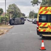 A car overturned after a collision in Rustington, with emergency services pictured at the scene. Photo: Sussex News and Pictures