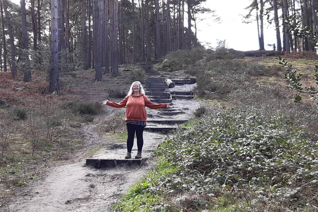 Elaine Hammond enjoying the birdsong at Sullington Warren