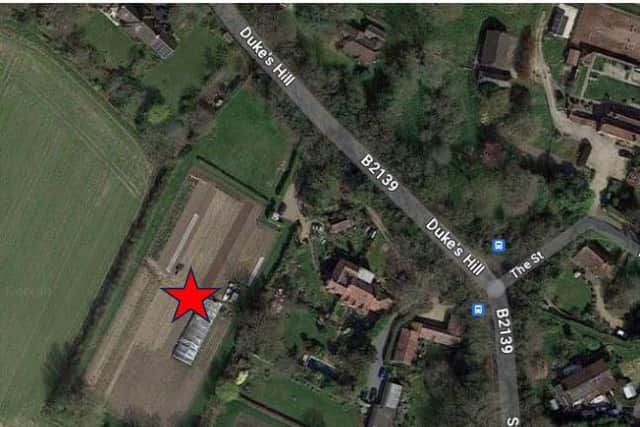 Marked in red, the site in Thakeham where it is proposed to build five detached five-bedroom houses. Photo: contributed