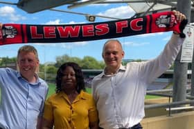 James MacCleary (JM), Lewes town Councillor Janet Baah and Ed Davey (ED) at Lewes FC ground the Dripping Pan