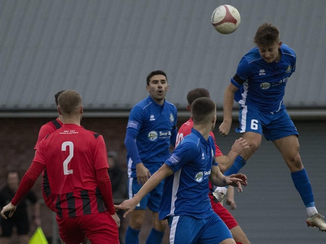 Selsey's Ben Dines gets head and shoulders above everyone to head goalwards