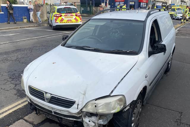 Police said a black Seat Ibiza collided with a white Vauxhall Astra van (pictured) on the level crossing. Photo: Eddie Mitchell