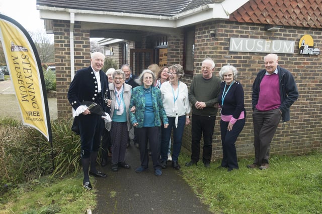 Andy Bliss, High Sheriff of West Sussex, with, from left, Dominie Hills, Ros Golds, Chris Tod, Jacquie Buttrriss, Lois Roemer, Leonie Etherington, Maggie Hollands, Andrew Woodfield, Muriel Wright and Paul Norris of Steyning Museum. Copyright Nick Quinn 2024