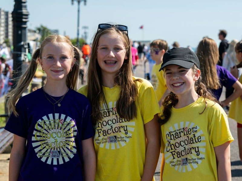 WMTC's Charlie cast members Matilda Thomson (Violet Beauregard in Team Marshmallows), Charlotte Howard (Veruca Salt in Team Sprinkles) and Bea King (Violet Beauregard in Team Sprinkles) at the Worthing Carnival on Sunday