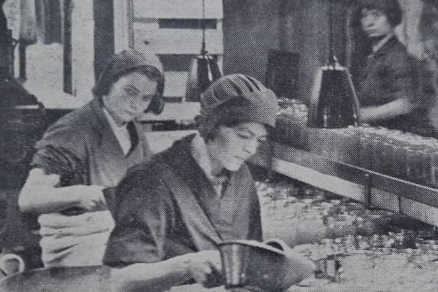 Conveyers revolved around, bringing in fresh batches of jars for the workers to fill with marmalade